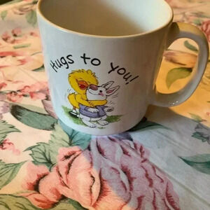 Duck Huging a Bunny Coffee Meg